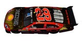 Signed Action 1/24 Scale Kevin Harvick #29 Shell Racing Yellow Chrome Diecast Car - Front View: Feel the excitement with Kevin Harvick's signature prominently displayed on the front of this collectible, capturing the spirit of NASCAR racing.