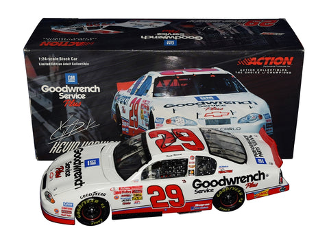 Autographed 2001 Kevin Harvick #29 White Goodwrench Dale Sr. Tribute diecast car, featuring detailed design and signed by Harvick and Richard Childress. Includes COA and lifetime authenticity guarantee.