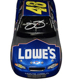 2002 Jimmie Johnson #48 Lowe's Racing rookie season diecast, signed by both Johnson and Chad Knaus. A rare collectible featuring detailed artwork and a Certificate of Authenticity.