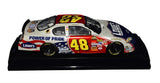 This 1/24 scale NASCAR diecast honors Memorial Day with a patriotic red, white, and blue design. Signed by Jimmie Johnson and Chad Knaus, it includes a COA and features accurate detailing from the 2007 race, making it a meaningful collectible and a thoughtful gift for fans of racing and American pride.