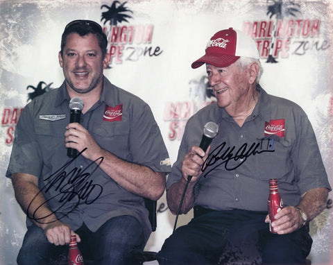 Authentic 2016 Darlington Throwback photo signed by NASCAR legends Tony Stewart and Bobby Allison during a Coca-Cola Racing press event. This 8x10 inch glossy image includes a COA and captures a unique tribute moment. A perfect collectible and great gift for fans of classic and modern NASCAR.