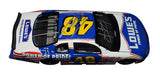 Premium 2X autographed Jimmie Johnson and Chad Knaus 2002 #48 Lowe's Power of Pride Team Caliber Pit Stop Series 1/24 scale NASCAR diecast collectible with Certificate of Authenticity. A rigid, plastic toploader is included for protection and display purposes, making this an excellent gift for racing fans.