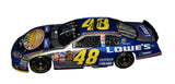Detailed view of the dual signed 2004 Jimmie Johnson and Chad Knaus Atlanta Win raced version Action 1/24 scale diecast showcasing realistic race wear, authentic autographs, and premium collector craftsmanship. Includes a Certificate of Authenticity and a rigid, plastic toploader for protection and display.