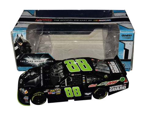 High-detail 1/24 scale 2012 Dale Earnhardt Jr. #88 Diet Dew Dark Knight Rises diecast car, signed by Dale Jr. and Rick Hendrick with COA. Shows vibrant Batman-themed graphics, collectible numbering, and premium finish. A rare piece that displays beautifully and makes an excellent gift for NASCAR or movie fans.