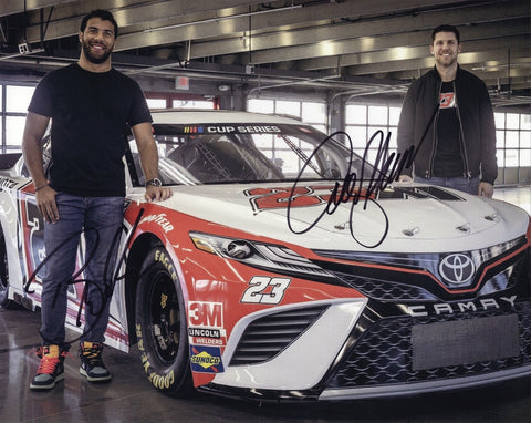 Dual autographed 2021 Bubba Wallace and Denny Hamlin 23XI Racing photo featuring both drivers alongside the #23 Michael Jordan Toyota team imagery. This signed 8x10 NASCAR collectible includes a COA, makes a great gift, and we are always here to help with any questions.
