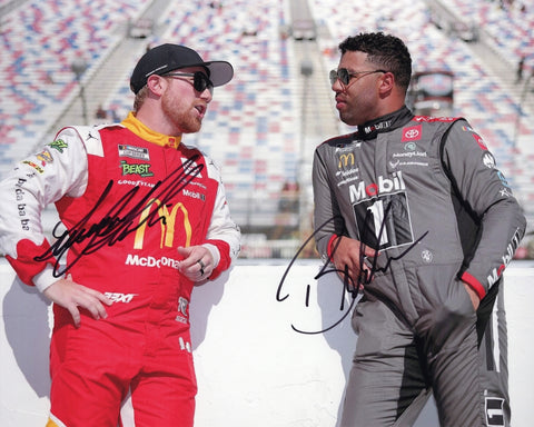 Autographed Bubba Wallace and Tyler Reddick 2025 pit road talk photo showing both 23XI Racing teammates in conversation during pre-race preparations, with team uniforms and pit equipment visible. This dual-signed 8x10 NASCAR collectible includes a COA, makes a great gift, and we are always here to help with any questions.