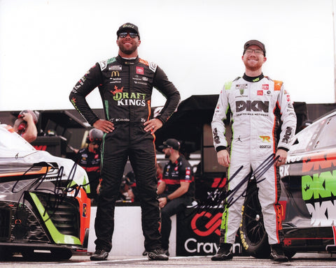 Autographed Bubba Wallace and Tyler Reddick 23XI Racing pit road photo showing both drivers standing together with their team gear and pit area visible. This dual-signed 8x10 NASCAR collectible includes a COA, makes a great gift, and we are always here to help with any questions.