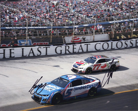 Dual autographed 2025 Kyle Larson and Carson Hocevar Bristol Motor Speedway photo showing both drivers together with the #5 Hendrick Motorsports car and #77 Chilis scheme visible. This signed 8x10 NASCAR collectible includes a COA, makes a great gift, and we are always here to help with any questions.