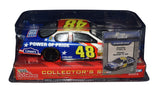 Collectible 2003 Action 1/24 scale Jimmie Johnson and Chad Knaus dual autographed Racing Champions Collector's Series #48 Lowe's Power of Pride Chase The Race diecast featuring detailed graphics and authentic signatures. Includes a Certificate of Authenticity and a rigid, plastic toploader for protection, display, and gift giving.