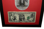Metallica's legendary band members—Kirk Hammett, James Hetfield, Robert Trujillo, and Lars Ulrich—autographed this 2009 Meet & Greet ticket and dollar bill photo. Framed at 11.5 x 14.5 inches, this signed item is perfect for collectors and makes an unforgettable gift for fans.