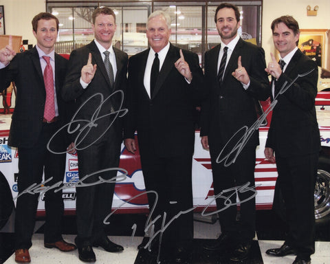 Five-autograph 2008 Hendrick Motorsports group photo showing Dale Earnhardt Jr., Jeff Gordon, Jimmie Johnson, Kasey Kahne, and Rick Hendrick standing together beside the #5 test car during Jr.’s arrival. This signed 8x10 NASCAR collectible includes a COA, makes a great gift, and we are always here to help with any questions.