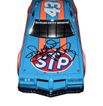 Experience the glory of NASCAR's golden era with the Autographed 1977 Richard Petty #43 STP Racing Diecast Car, a 1/24 scale vintage Franklin Mint collectible. COA for authenticity.