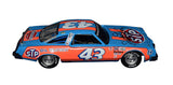 Celebrate racing history with the Autographed 1977 Richard Petty #43 STP Racing Diecast Car, a vintage Franklin Mint masterpiece personally signed by Petty. COA provided.