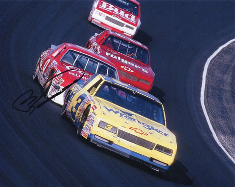 Relive the iconic 'Pass in the Grass' moment with this AUTOGRAPHED 1987 Bill Elliott #9 Coors Racing PASS IN THE GRASS Vintage Photo. Dale Sr.'s signature, meticulously captured, is the highlight of this collector's gem. Your purchase includes a Certificate of Authenticity, providing undeniable proof of its genuineness. We proudly offer a 100% lifetime authenticity guarantee, ensuring your investment is secure.