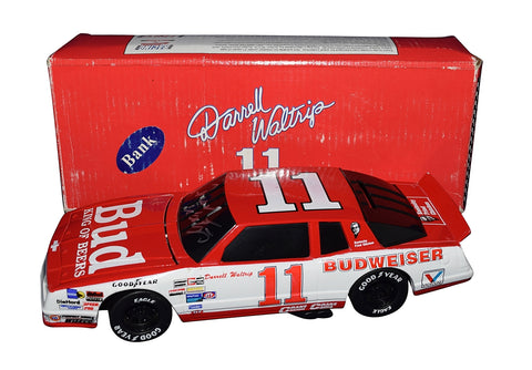 Travel back in time with the Autographed 1994 Darrell Waltrip #11 Budweiser Racing Vintage Black Window Bank Diecast Car, a limited vintage collectible. Exclusive signatures acquired through special signings and HOT Pass access. Includes Certificate of Authenticity (COA) – an ideal gift for NASCAR fans and collectors.