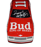 Own a piece of history with the Autographed 1994 Darrell Waltrip #11 Budweiser Racing Vintage Black Window Bank Diecast Car, a limited vintage collectible. Exclusive signatures acquired through special signings and HOT Pass garage access. Includes Certificate of Authenticity (COA) – a cherished item for NASCAR fans and collectors.