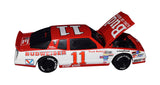 Relive the golden era of NASCAR with the Autographed 1994 #11 Darrell Waltrip Budweiser Racing Vintage Black Window Bank Diecast Car. Limited vintage collectible, it proudly displays exclusive signatures acquired through special signings and HOT Pass access. COA included – the ultimate gift for racing enthusiasts and collectors.