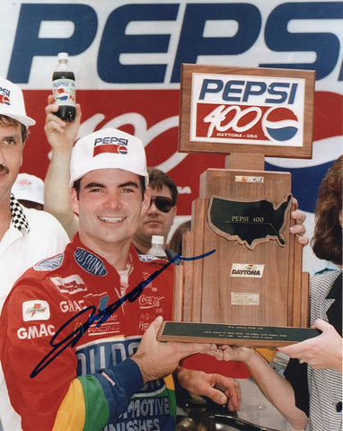 Experience the thrill of NASCAR history with this autographed 1995 Jeff Gordon #24 DuPont Pepsi 400 Win signed 8x10 inch glossy NASCAR photo. Authenticated signature and COA included. Limited stock!
