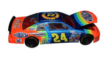 Autographed 1995 Jeff Gordon #24 DuPont Rainbow Diecast Car - Side View: This captivating angle showcases the authentic signatures of Jeff Gordon and other racing legends adorning the sleek body of the #24 DuPont Rainbow car. The meticulous detailing, including sponsor logos and race markings, vividly brings to life Gordon's championship-winning ride.