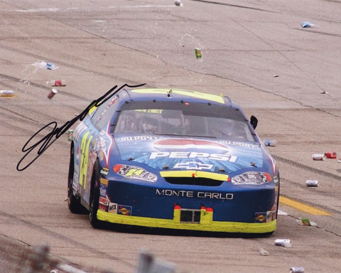 Step into the unforgettable 2004 Pepsi Shards TALLADEGA WIN with Jeff Gordon through this AUTOGRAPHED 8x10 Inch NASCAR Photo. Witness the iconic moment when beer cans rained down in celebration of Gordon's triumph. Each signature on our collectibles is carefully acquired through exclusive public/private signings and coveted garage area access via HOT Passes, ensuring unmatched authenticity. 