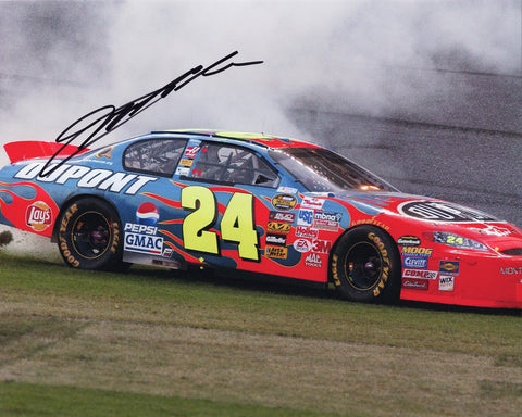 Revisit the thrilling moment when Jeff Gordon seized victory at the 2005 DAYTONA 500 with this AUTOGRAPHED 8x10 Inch NASCAR Photo, capturing the euphoric victory burnout. This iconic image encapsulates a historic milestone in Gordon's illustrious career, epitomizing the spirit of DuPont Racing. Each signature on our collectibles is meticulously acquired through exclusive public/private signings and sought-after garage area access via HOT Passes, guaranteeing the utmost authenticity.