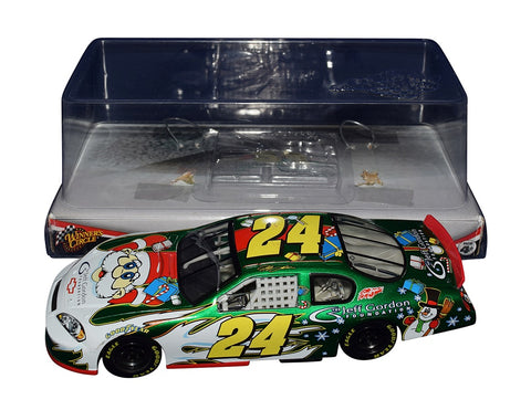 Autographed 2006 Jeff Gordon #24 Christmas Santa Car Signed Diecast - Side View: Jeff Gordon's iconic car gets a festive makeover with Santa Claus-themed design elements, including authentic signatures, perfect for spreading holiday cheer.