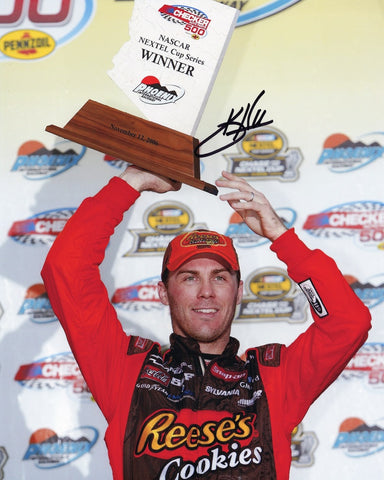 Exclusive autographed Victory Lane Trophy photo commemorating Kevin Harvick's remarkable 2006 Phoenix Win. Don't miss out on this rare piece of NASCAR heritage!