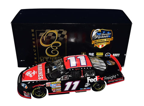 Autographed Denny Hamlin #11 FedEx American Heroes Diecast Car - Side View: Celebrate NASCAR excellence with this autographed diecast car, featuring Denny Hamlin's iconic FedEx American Heroes tribute, meticulously signed for authenticity.