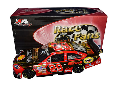 Autographed 2007 Kevin Harvick #29 Shell Racing Yellow Chrome Signed Diecast Car - Side View: Celebrate Kevin Harvick's connection with race fans with this exclusive diecast car, featuring authentic signatures obtained through exclusive signings.