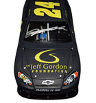 Signed Action 1/24 Scale Jeff Gordon #24 A Hero's Journey COT Test Car Diecast - Front View: Feel the spirit of NASCAR heroism with Jeff Gordon's signature prominently displayed on the front of this collectible, supporting a worthy cause.