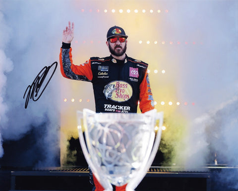 Add this genuine Martin Truex Jr. autographed 8x10 inch NASCAR photo to your memorabilia collection, featuring his confident stance with the championship trophy during driver intros at Homestead. Limited availability – don't wait!