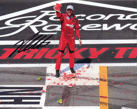 Add this genuine Ross Chastain autographed 8x10 inch NASCAR photo to your memorabilia collection, featuring the memorable Watermelon Smash celebration from his 2019 Pocono win. Limited availability – don't wait!
