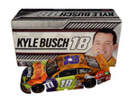 Autographed 2020 Kyle Busch #18 M&M's Racing HALLOWEEN TREAT TOWN Diecast Car Description: A close-up view of the autographed 2020 Kyle Busch #18 M&M's Racing HALLOWEEN TREAT TOWN diecast car, featuring the captivating Halloween-themed design. A rare collectible for NASCAR enthusiasts and Halloween lovers.