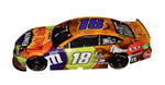 Limited Edition Kyle Busch #18 M&M's Racing HALLOWEEN TREAT TOWN Diecast Car Description: An exciting image of the limited-edition Kyle Busch #18 M&M's Racing HALLOWEEN TREAT TOWN diecast car, autographed by Kyle Busch. A must-have for collectors, with a unique Halloween-inspired design.