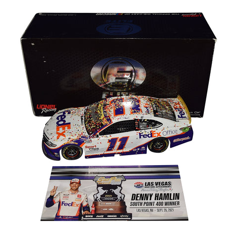 Experience the excitement of Denny Hamlin's 2021 Las Vegas win with the Autographed #11 FedEx Racing Diecast Car. Limited edition #017 of 149, featuring exclusive signatures from public/private signings and HOT Pass access. Includes Certificate of Authenticity (COA). Ideal for NASCAR fans and collectors.