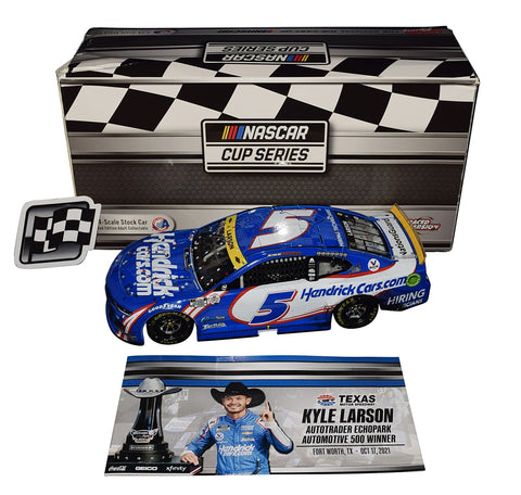 2021 Kyle Larson #5 Texas Win Diecast Car - Limited edition #0155, autographed by Larson, includes Certificate of Authenticity. A prized NASCAR collectible capturing the essence of victory.