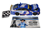 NASCAR Triumph Collectible - 2021 Kyle Larson #5 Texas Win Diecast Car, featuring the exclusive raced version and an authentic Larson signature. A symbol of racing greatness.