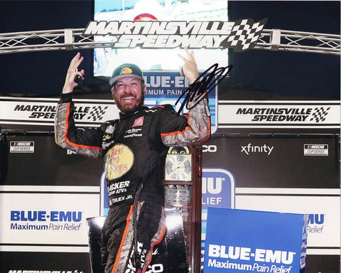 Capture the excitement of Martin Truex Jr.'s 2021 Martinsville victory with this genuine autographed 8x10 inch NASCAR photo, featuring the iconic Victory Lane celebration. Limited availability – order now!
