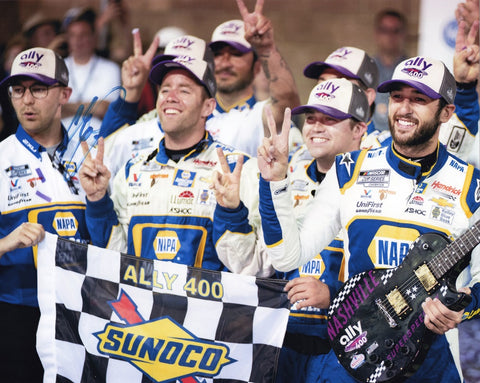 Chase Elliott's autographed 2022 NASHVILLE WIN NASCAR photo, featuring the Victory Lane Guitar, a symbol of triumph and celebration.
