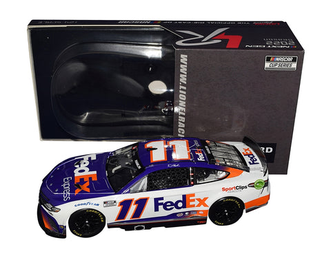 Experience the thrill of NASCAR with the Autographed 2022 Denny Hamlin #11 FedEx Express Racing Diecast Car, a limited edition #0574 of 1,008. Exclusive signatures acquired through public/private signings and HOT Pass access. Includes a Certificate of Authenticity (COA) – the perfect gift for racing enthusiasts and collectors!