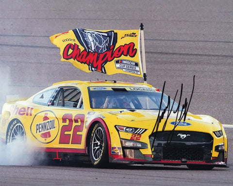 Capture the excitement of Joey Logano's championship win with the AUTOGRAPHED #22 Pennzoil NASCAR CHAMPION Signed 8x10 Inch Picture. This iconic photo depicts Logano proudly holding the Championship Flag, symbolizing his victory.
