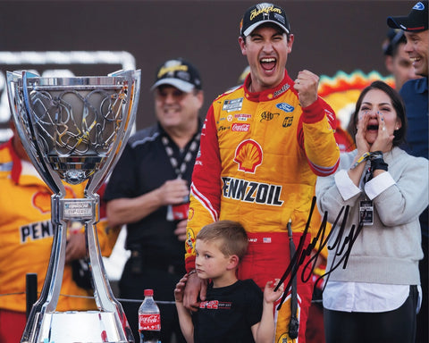 Make memories last with the AUTOGRAPHED 2022 #22 Pennzoil Racing NASCAR CHAMPION Signed 8x10 Inch Picture. This exclusive photo captures Joey Logano's championship triumph, featuring him alongside his family in a heartwarming pose with the championship trophy.
