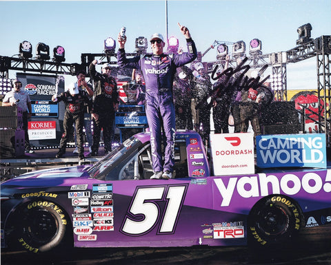 Authentic Kyle Busch autographed 2022 Yahoo Racing SONOMA TRUCK WIN 8x10 photo with Certificate of Authenticity, celebrating in Victory Lane.