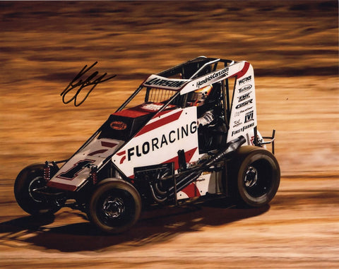 Immerse yourself in the excitement of dirt track racing with this autographed 8x10 glossy photo featuring Kyle Larson's FloRacing Team Midget Sprint Dirt Car. From the intense battles on the track to the triumphant moments in victory lane, this image captures Larson's journey at the Placerville, California Track with unparalleled clarity.