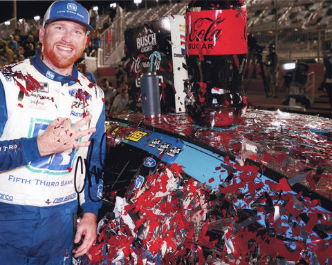 Relish the exhilaration of victory with this AUTOGRAPHED 2023 Chris Buescher #17 Fifth Third Bank DAYTONA WIN (Victory Lane Confetti) 8x10 Inch NASCAR Photo. Each signature embodies authenticity, meticulously secured through exclusive signings and coveted garage area access via HOT Passes. Your purchase comes with a Certificate of Authenticity, validating its true heritage.