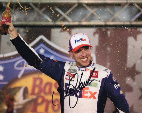 Experience the excitement of victory with the AUTOGRAPHED 2023 Denny Hamlin #11 FedEx BRISTOL WIN NASCAR Photo. This iconic 8x10 inch picture immortalizes the thrilling Victory Lane celebration at Bristol Motor Speedway. Each signature signifies authenticity, meticulously acquired through exclusive signings and coveted garage access via HOT Passes. 