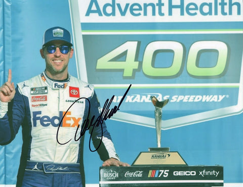Autographed Denny Hamlin #11 FedEx Racing Kansas Race Win NASCAR Picture with COA. Celebrate victory with this signed 9X11 glossy photo. Perfect for NASCAR fans and collectors.