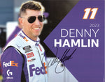 Autographed Denny Hamlin #11 FedEx Racing Official Hero Card with COA. Celebrate Denny Hamlin's career with this signed 9X11 glossy photo. A must-have for NASCAR fans and collectors.