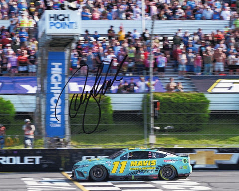 Experience the triumphant moment of the 2023 Mavis Racing victory at Pocono with the AUTOGRAPHED Denny Hamlin #11 8x10 Inch NASCAR Photo. This remarkable image captures the euphoria as Denny Hamlin triumphantly crosses the finish line, draped in the iconic checkered flag at the renowned Pocono Raceway. Our dedication to authenticity ensures that every signature is meticulously acquired through exclusive public/private signings and coveted garage area access via HOT Passes.