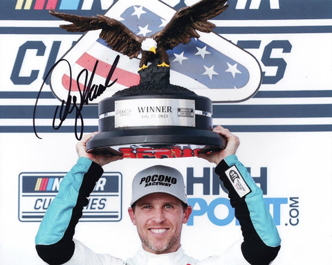 Capture the excitement of the 2023 Mavis Racing victory at Pocono with the AUTOGRAPHED Denny Hamlin #11 8x10 Inch NASCAR Photo, featuring the prestigious Eagle Trophy. This iconic photograph immortalizes the historic moment when Denny Hamlin clinched victory, proudly hoisting the majestic Eagle Trophy in the air amidst the cheering crowd's applause.